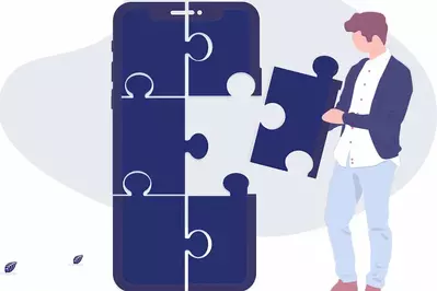 guy putting a puzzle piece of an app together