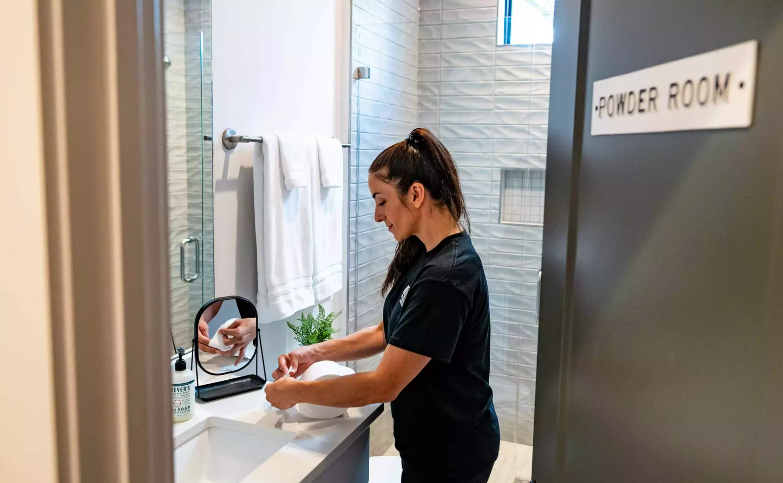 Women cleaning bathroom