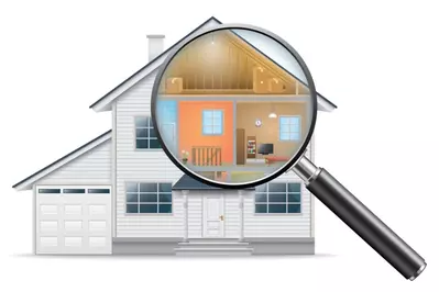 magnifying glass on house to show inspection