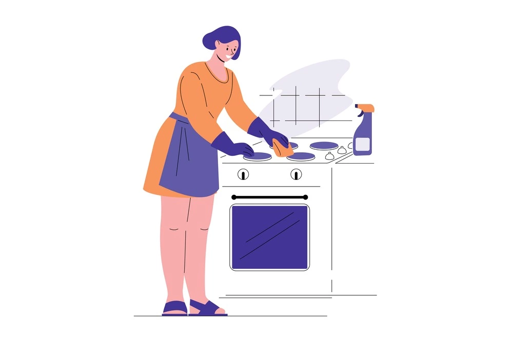 woman cleaning stove