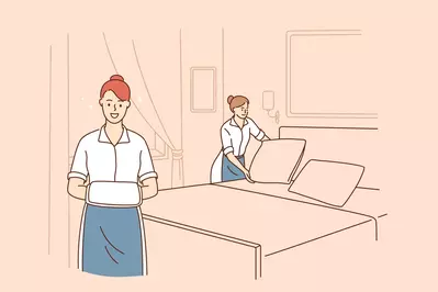 housekeepers making bed